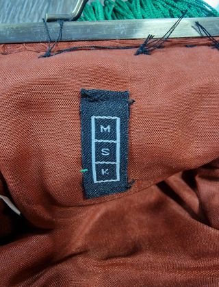 Bolso pequeño tipo clutch con monedas