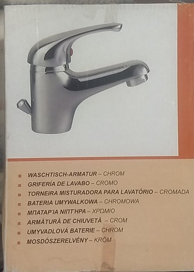 Grifo lavabo y tapón desagüe