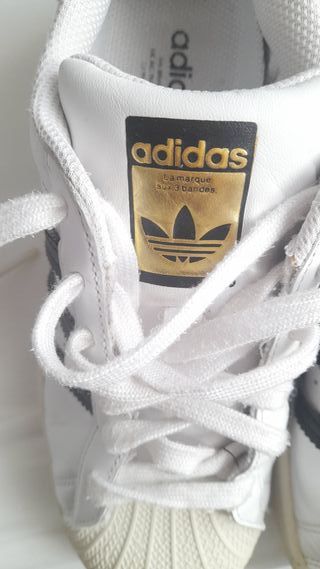 Zapatillas adidas raya negra