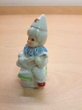 Statuina natalizia bambino con chitarra