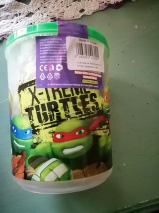 Salvadanaio con 100 stickers - Ninja Turtles ~