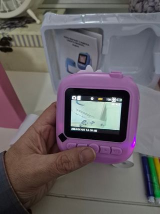 Camara de fotos con impresión.  NUEVA