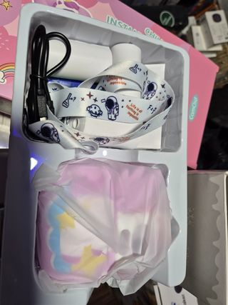 Camara de fotos con impresión.  NUEVA