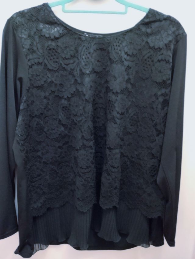 Casacca nera con pizzo