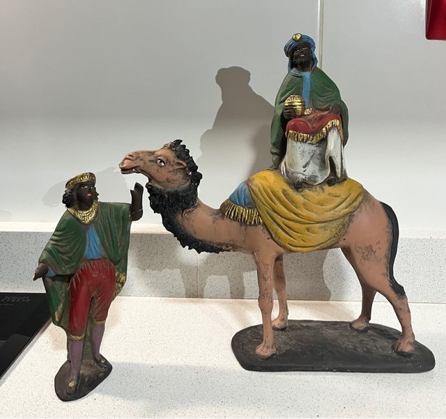 Rey mago Baltasar a camello con paje