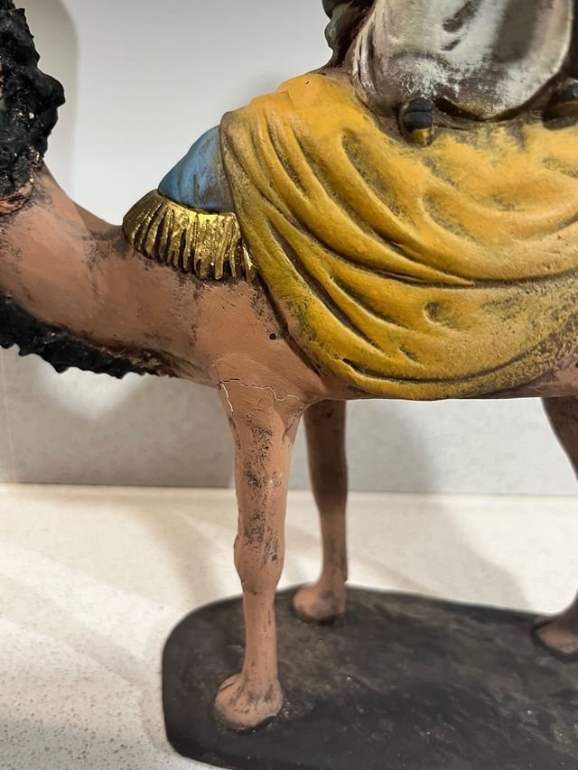 Rey mago Baltasar a camello con paje