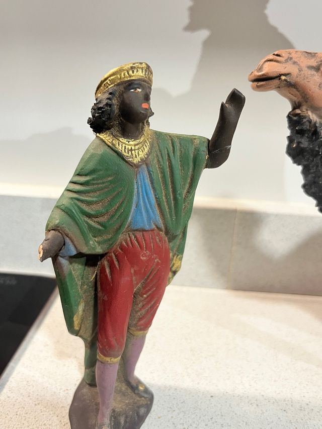 Rey mago Baltasar a camello con paje