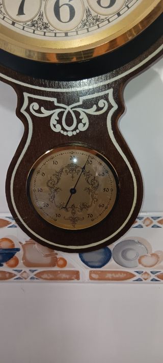 METOPA CON RELOJ E INTRUMENTO DE METEORO