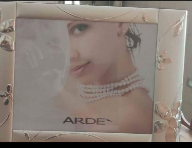 Cornice in argento Arde'