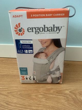 Mochila Ergobaby + protector invierno