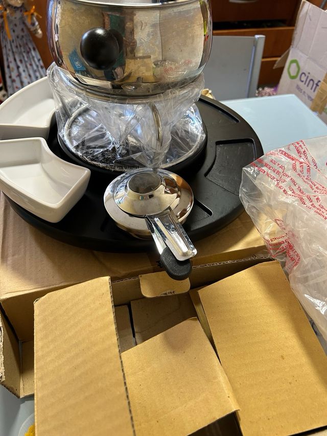 Por mudanza vendo fondues de acero inoxidable