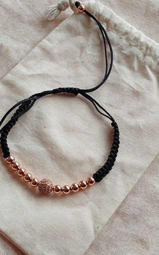 Pulsera ajustable cuentas color oro rosa