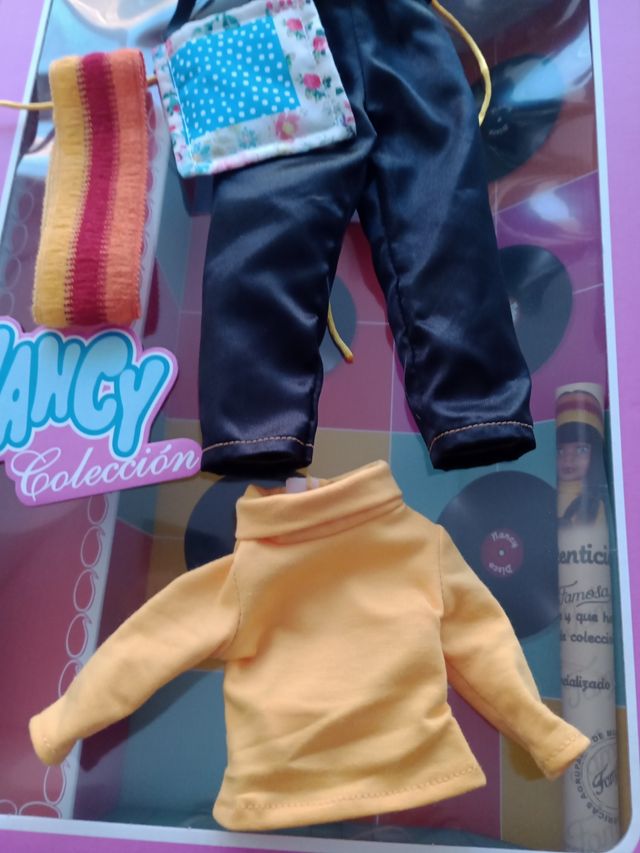 Caja Nancy disco con ropa y certificado