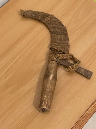 Antico attrezzo agricolo