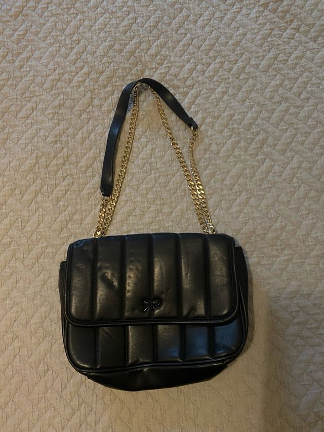 Bolso negro cadenas