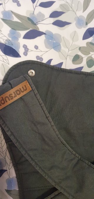 Mochila portabebé.