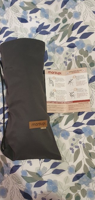 Mochila portabebé.