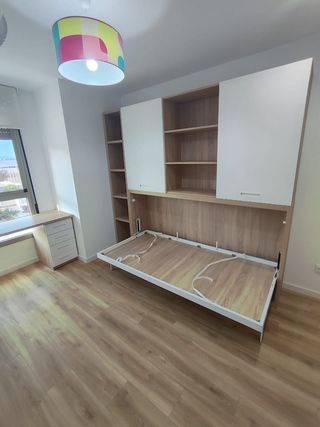 Cama abatible con armario superior