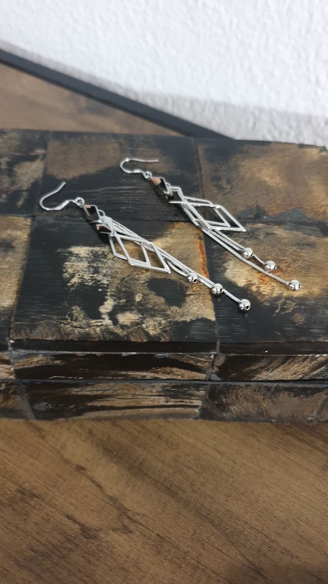 Pendientes largos de plata de Ley 925 .