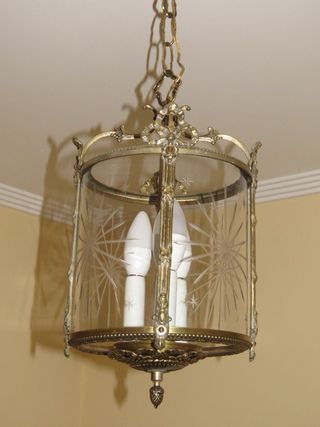 Antigua lámpara de bronce