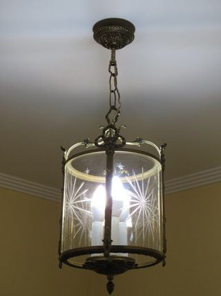 Antigua lámpara de bronce