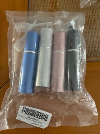 Botellas para productos de viaje a estrenar