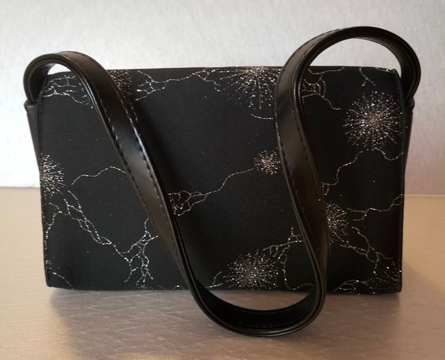 Borsetta elegante in tessuto ed ecopelle nera