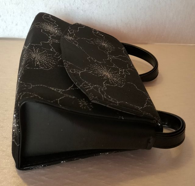 Borsetta elegante in tessuto ed ecopelle nera