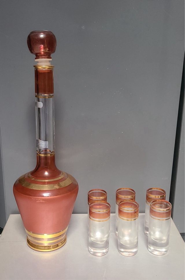 Juego de botella y vasos de chupito