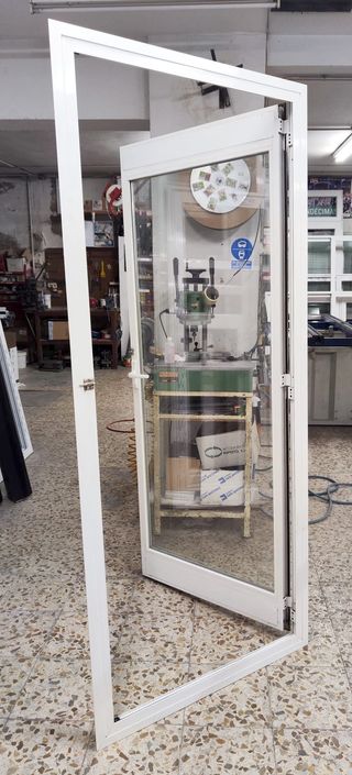 Puerta de aluminio 86,5 x 209 Cm. con Climalit