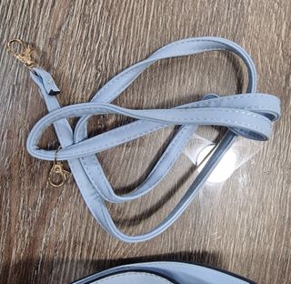 Riñonera redonda azul celeste