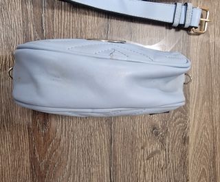 Riñonera redonda azul celeste