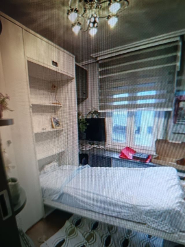 Cama plegable y armario