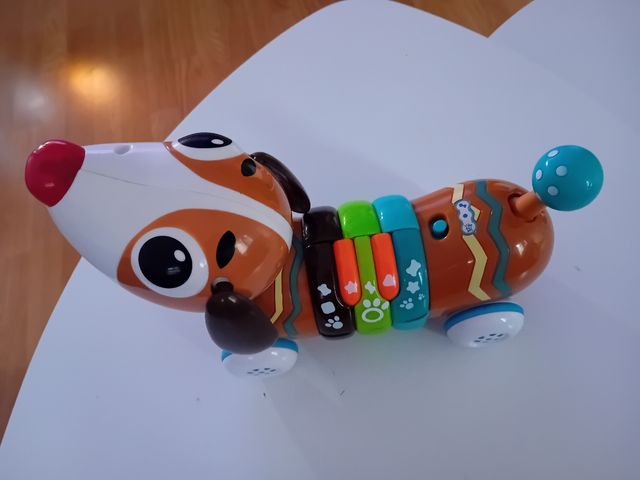 Juguete musical. Perro con luz y melodia