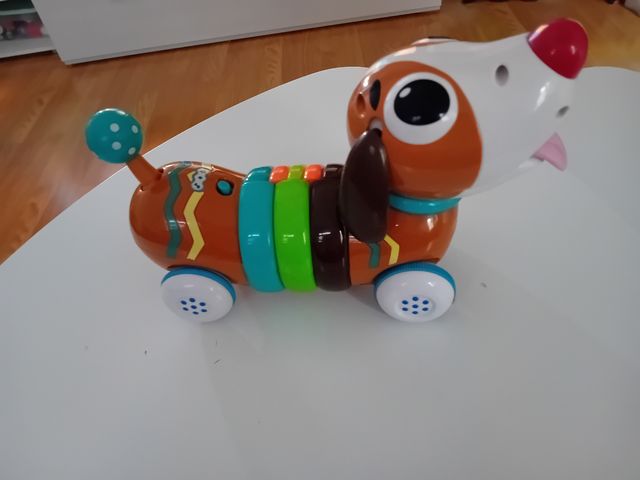 Juguete musical. Perro con luz y melodia