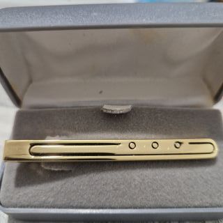 Pasador de corbata metal dorado