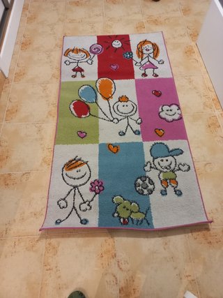Alfombra  habitación infantil.
