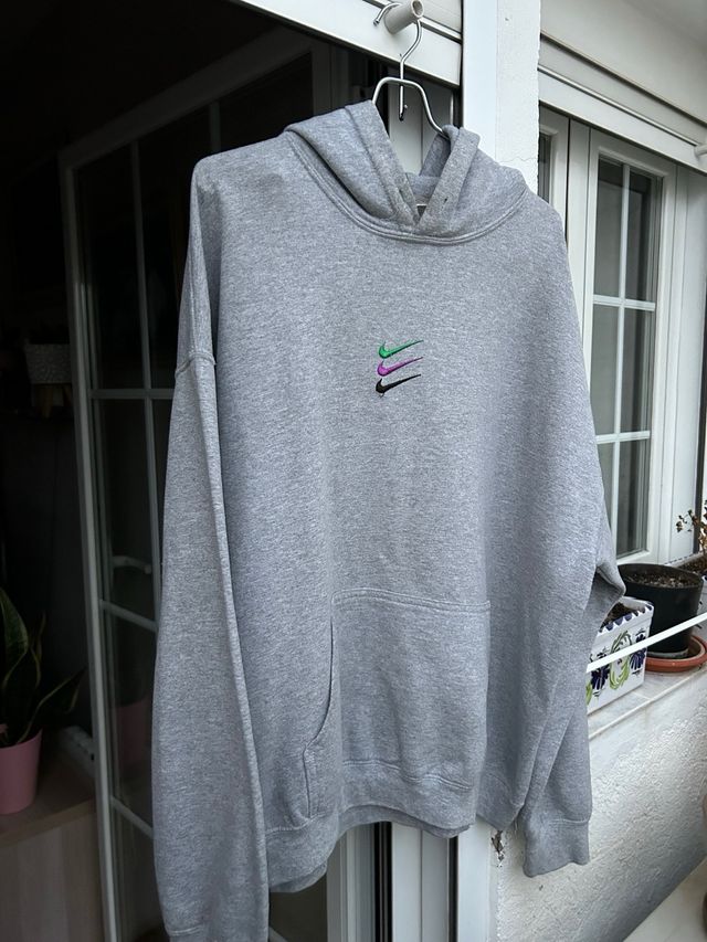 Sudadera con capucha tres ticks