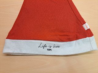 Cappello da Babbo Natale Tom. Life is live