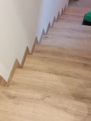 Colocador derecholas y platos de ducha