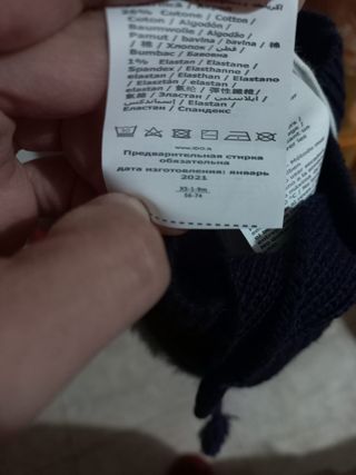 Cuffietta con pon-pon e treccine 