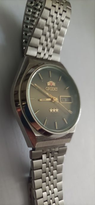 Relógio Orient Crystal automático com calendário