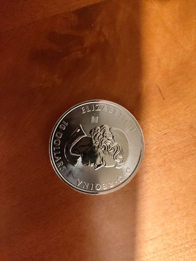 Moneda DosOnza plata