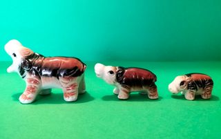 Miniatura vintage famiglia ippopotami ceramica