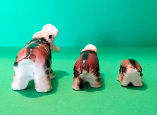 Miniatura vintage famiglia ippopotami ceramica