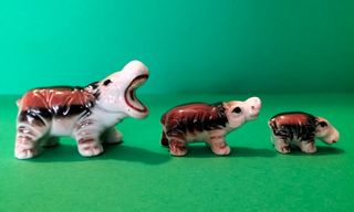 Miniatura vintage famiglia ippopotami ceramica