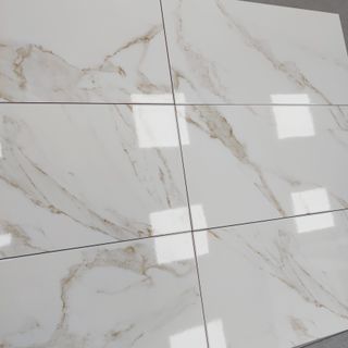 Lote azulejos imitación mármol vetas doradas pared