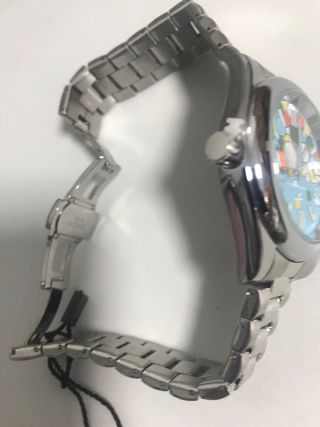 RELOJ CON ESFERA INTERIOR de COLORES