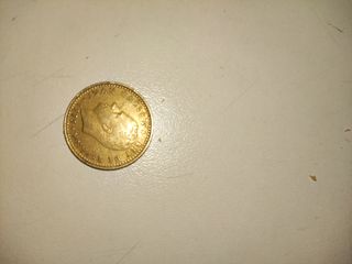 Una peseta de 1975 estrella 79