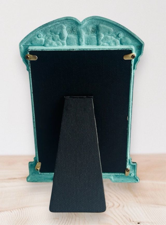 Marco de fotos de bronce